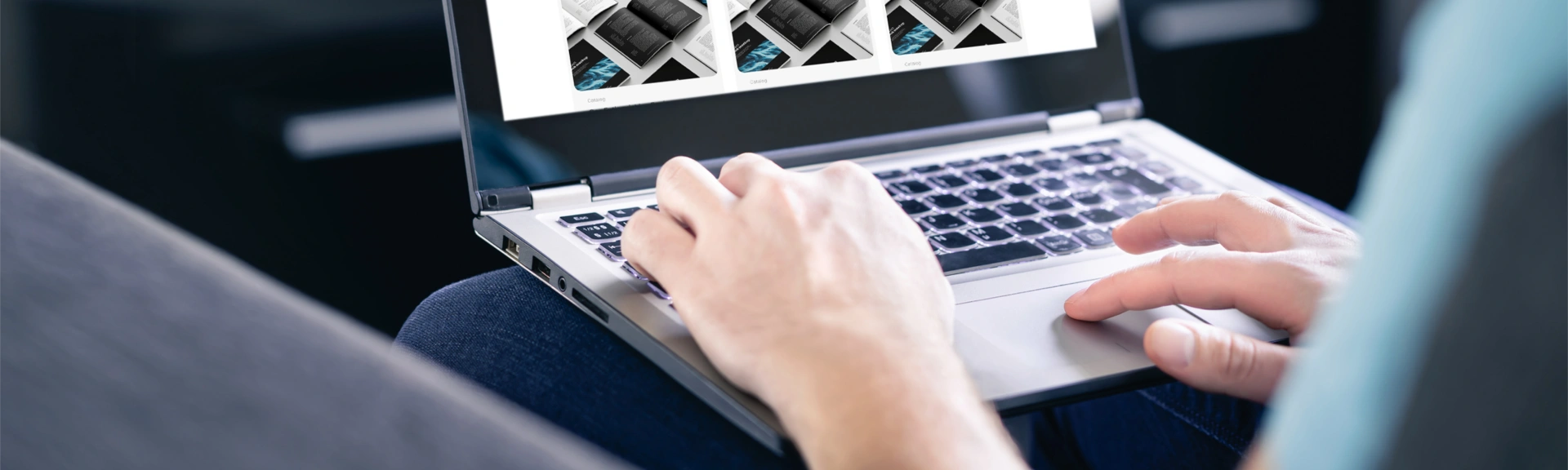 A woman downloading files on a computer.